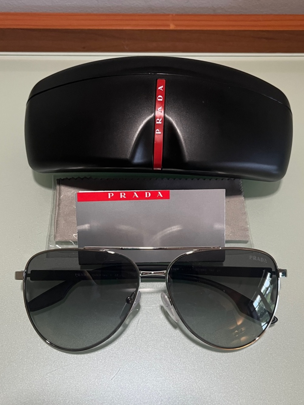 Prada Lina Rossa SPS 52W Silver Aviator Sunglasses with Black/Grey Lenses
